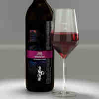 A pour of 2023 Venom with label shown on bottle